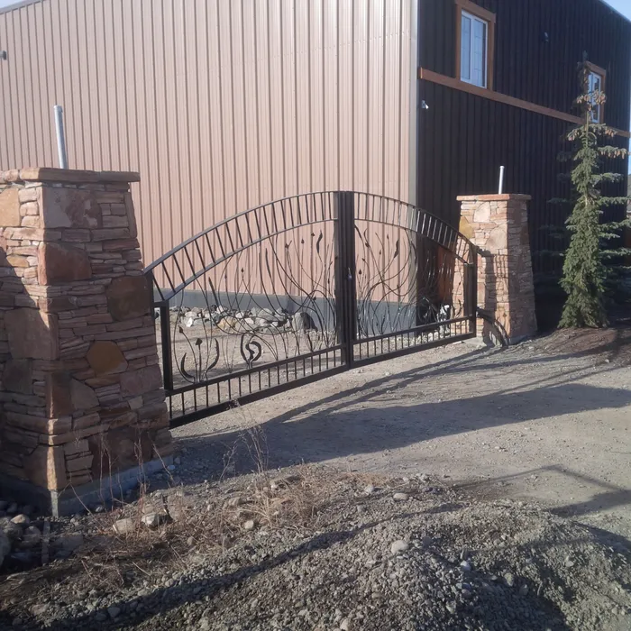 Custom large iron driveway gate