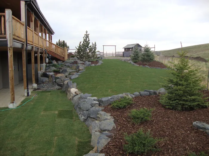 Beautifully sloped landscaped yard