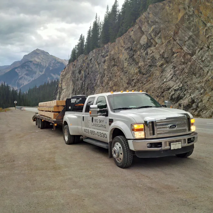 Truck hauling wood and timber for landscaping